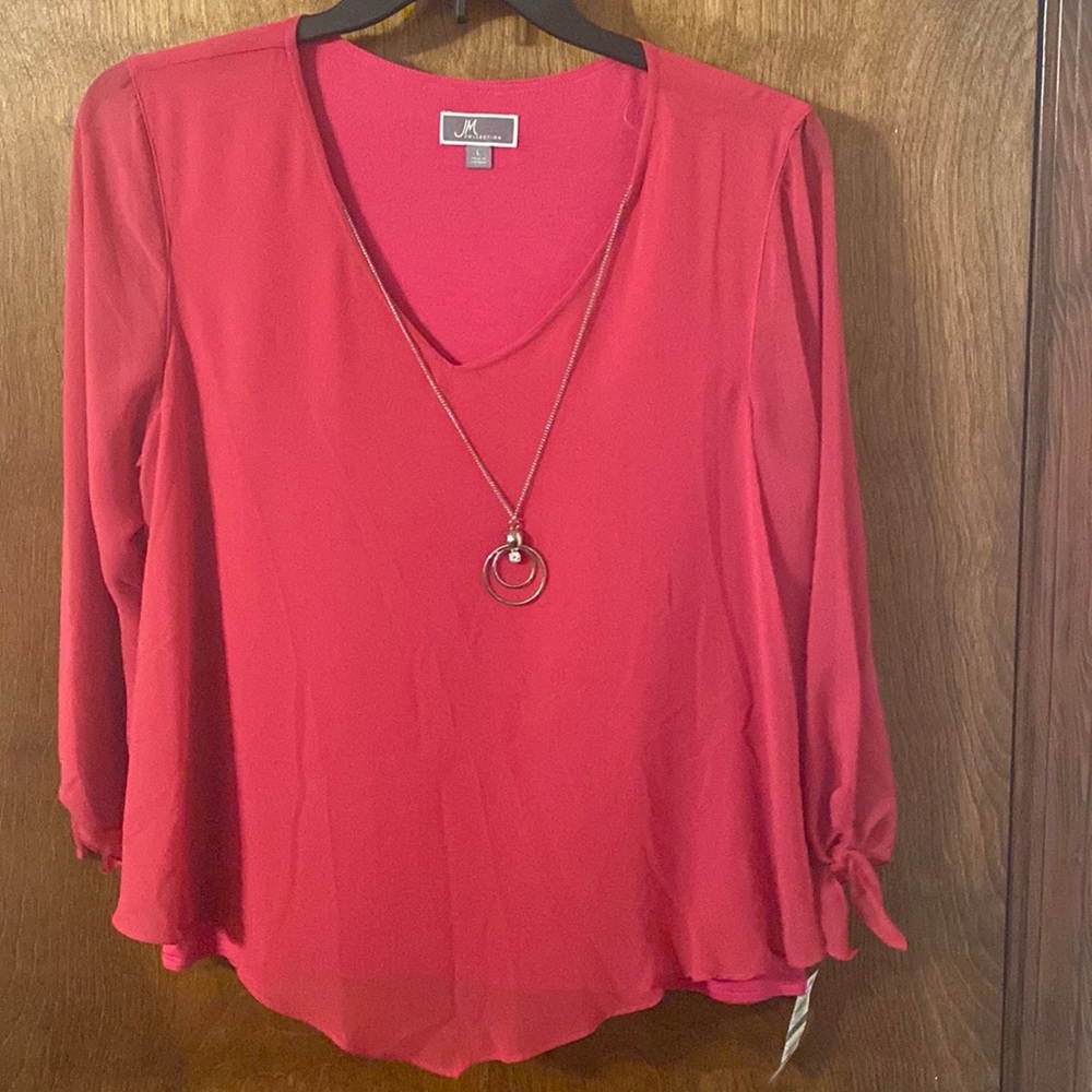 Bright Pink blouse with silver necklace